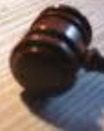 A close up of the side of a judge 's gavel.